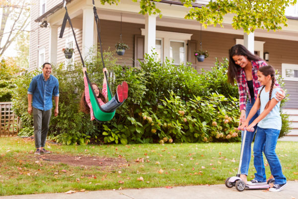 family of four enjoying activities outside to help improve mood