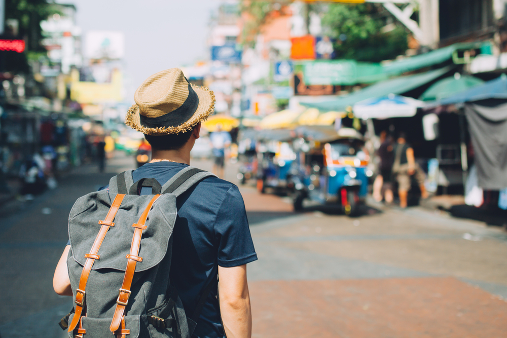 traveler exploring the outdoor markets in Thailand