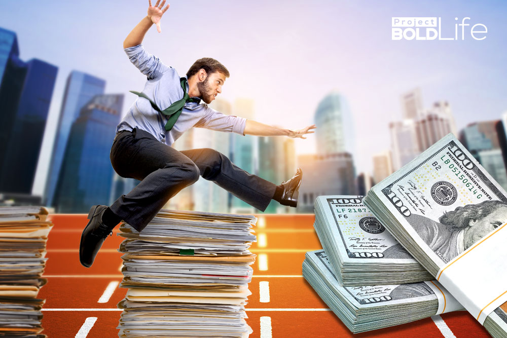 a man jumping hurdles made of giant money bills in a racetrack, thus symbolizing man's fight with limiting money beliefs