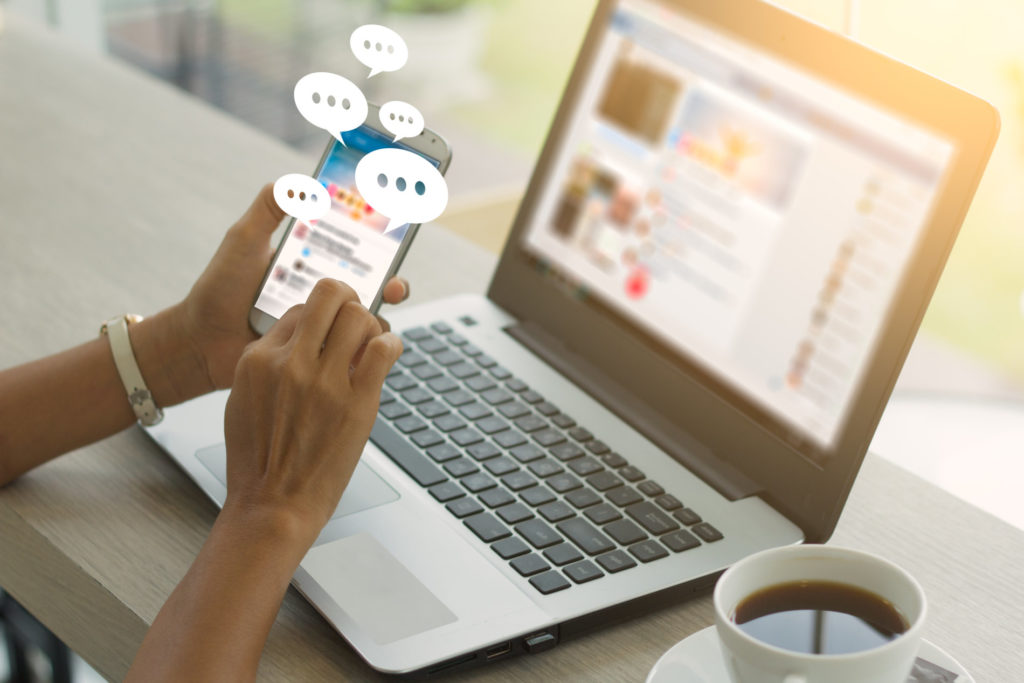 woman posting on social media - how to handle divorce on social media