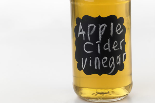 bottle of apple cider vinegar with chalkboard label