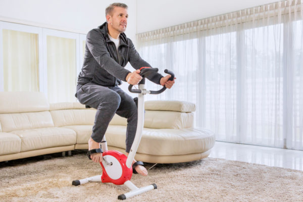 Dude riding an exercise bike