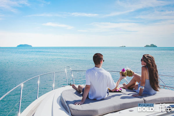 A couple on the bow of a boat