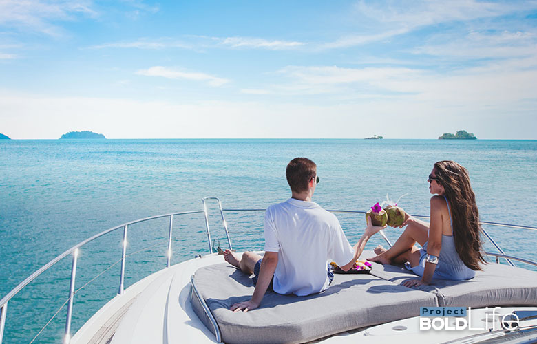 A couple on the bow of a boat