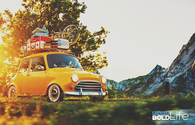 People in a tiny French car