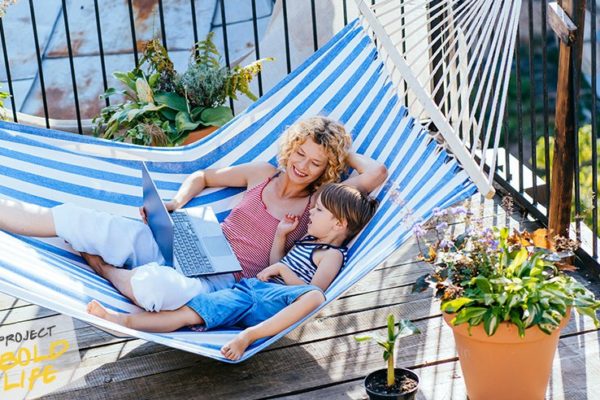 A mom and her kid in a hammock, talking mental health
