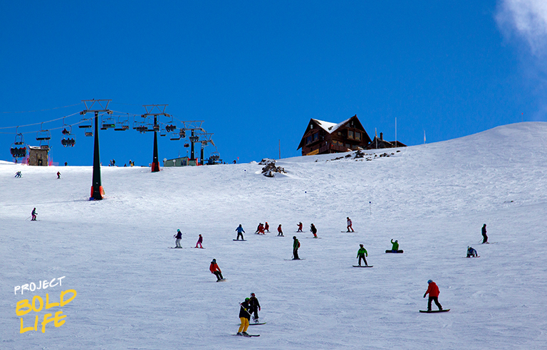 A bunch of people risking their lives on the slopes