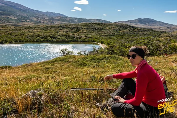 A woman pointing at the top spring travel destinations