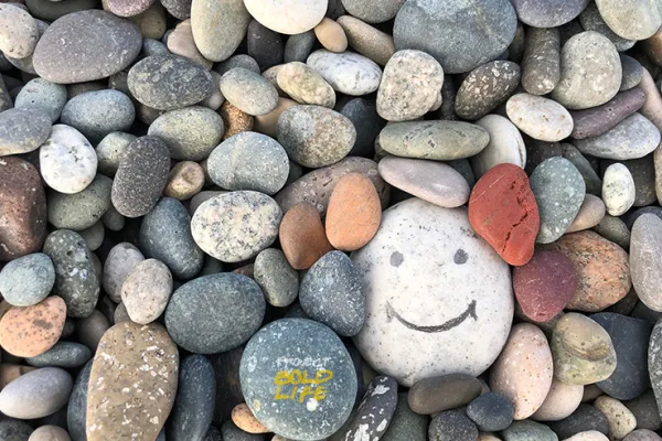 A rock doing acts of kindness