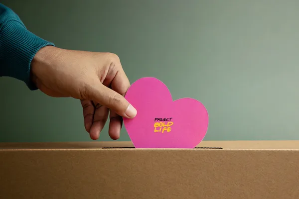 someone showing love to your community on Valentine's Day