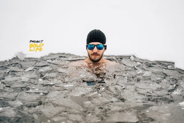 a dude exploring the benefits and risks of ice baths